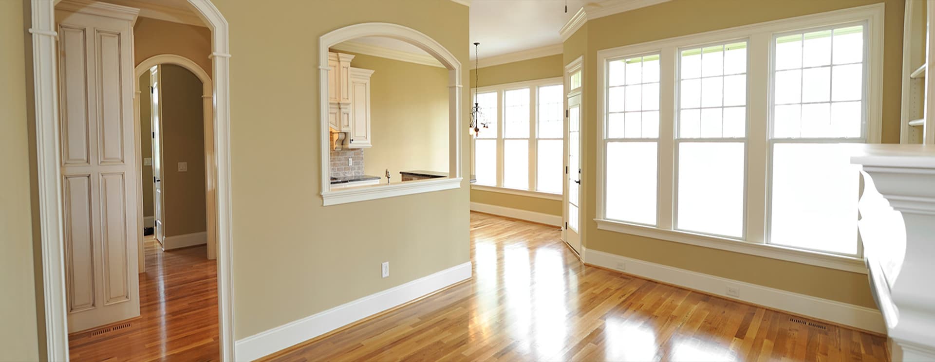 Painting job completed by Extreme Painting, interior with stained floors