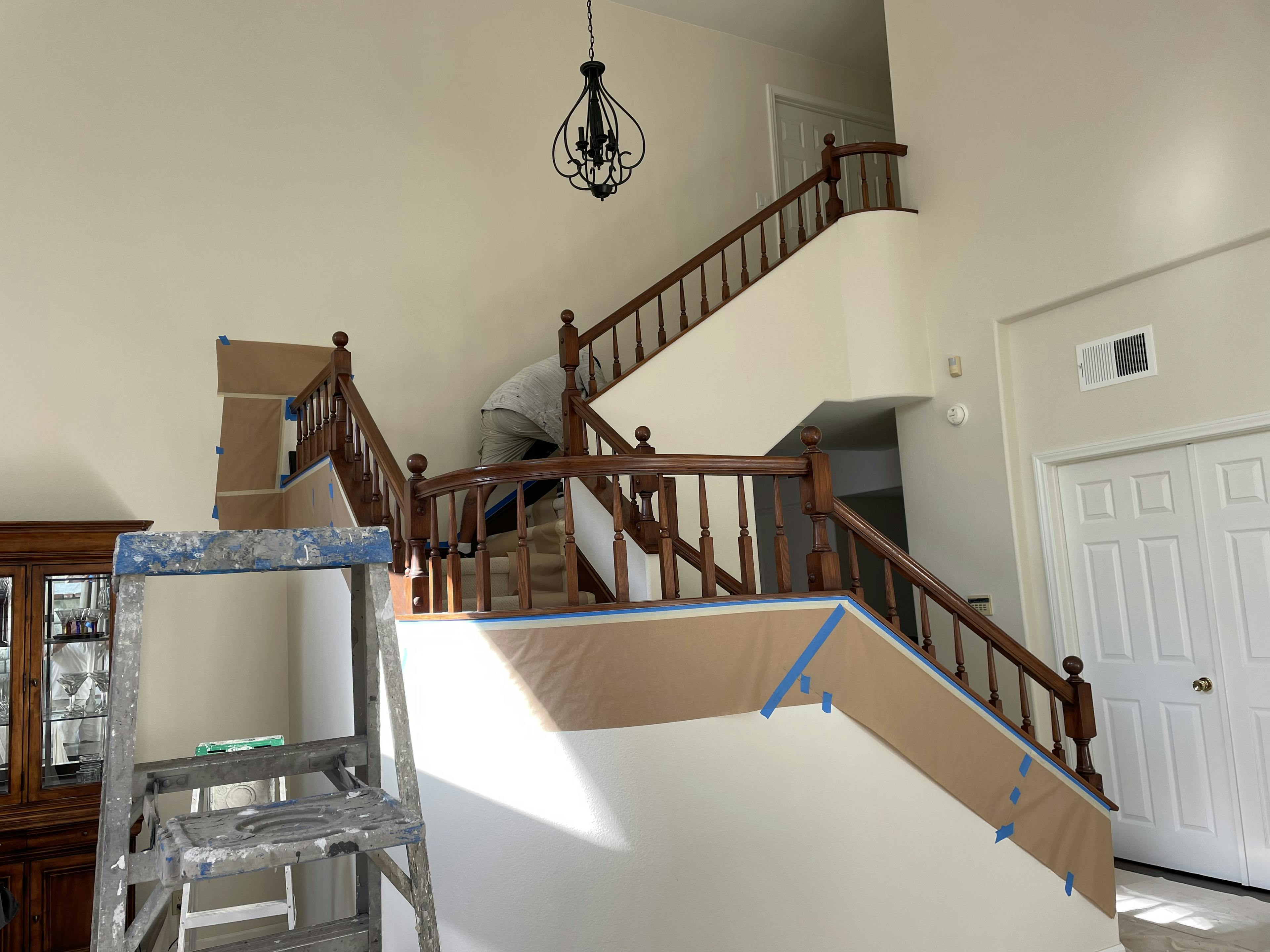 Before image by extreme painting for Work in progress: interior repaint and stairway refinish.