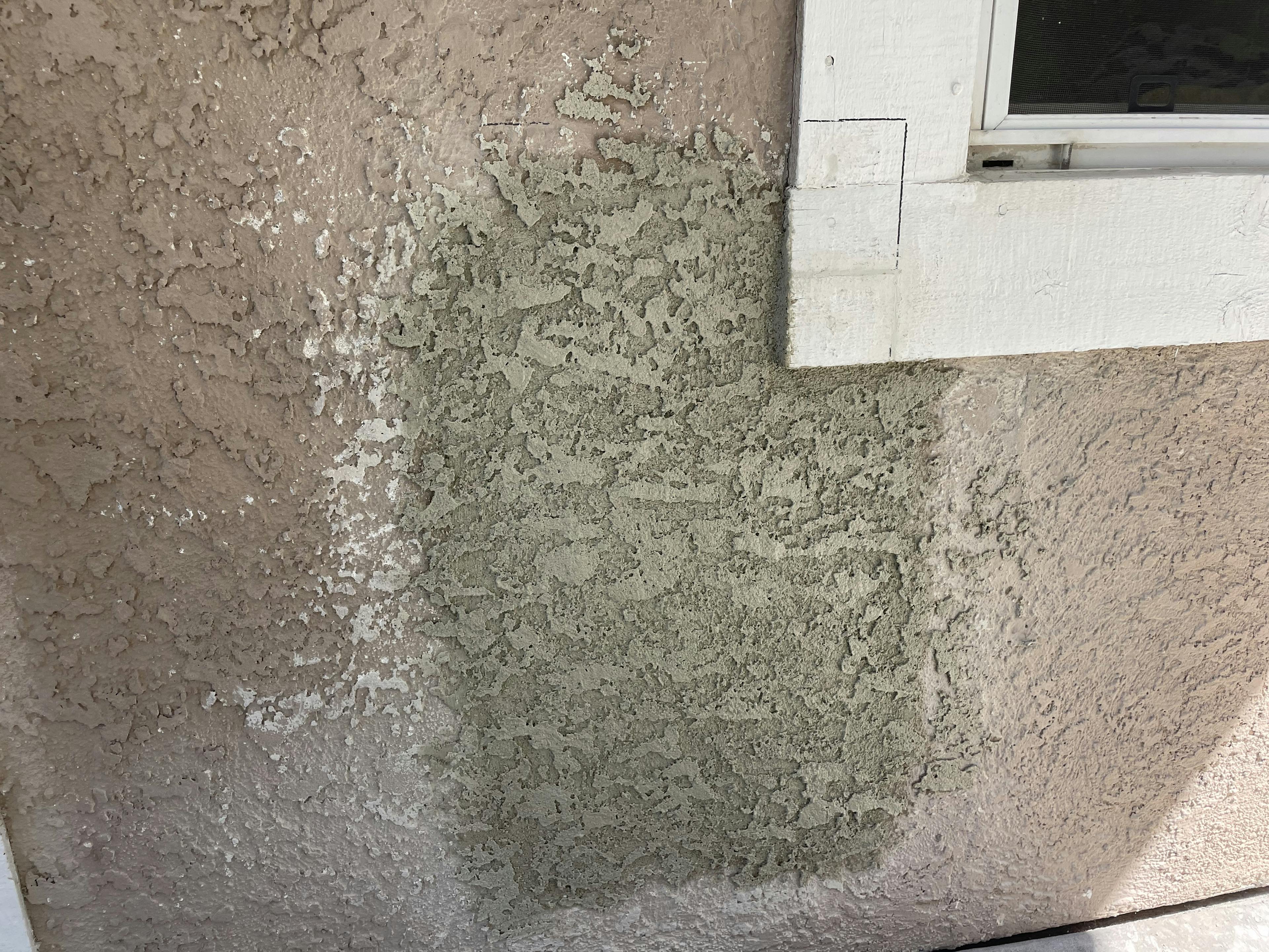 Before image by extreme painting for Stucco repair and repaint.